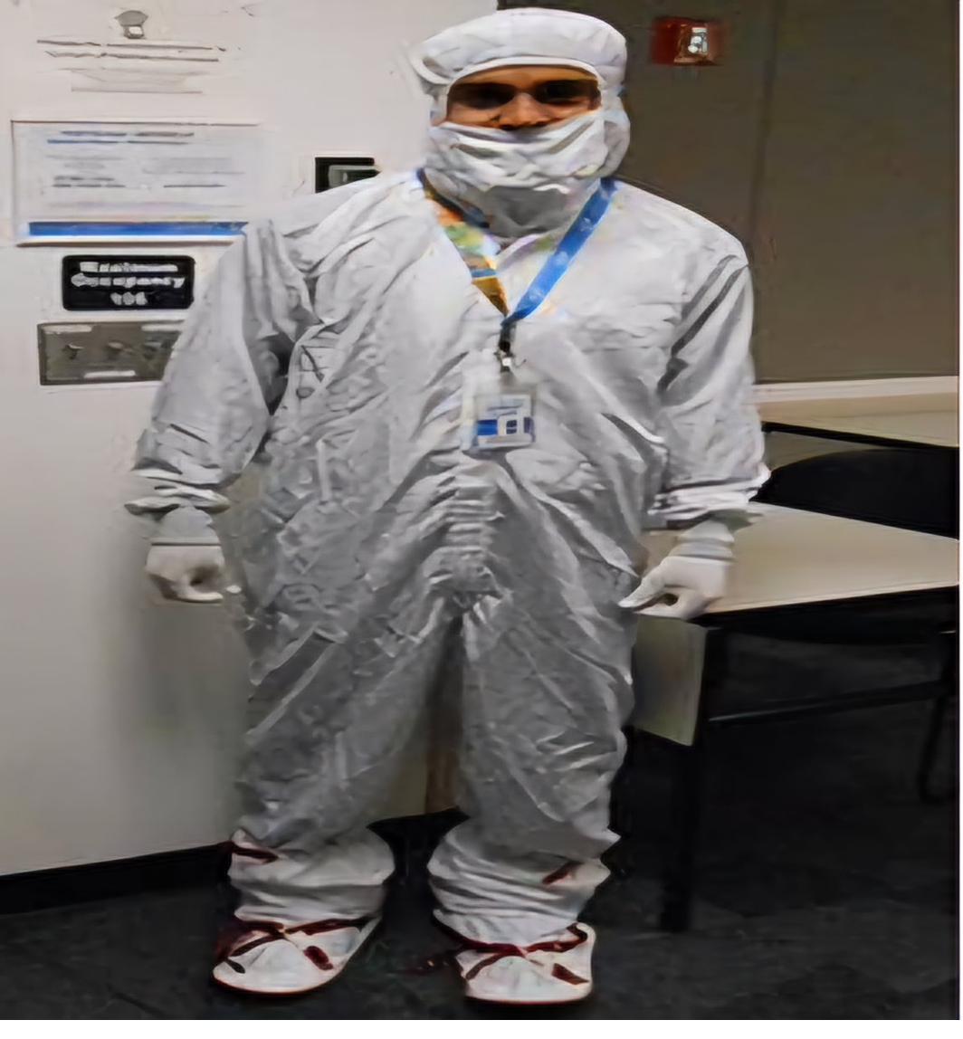 In cleanroom bunny suit at Intel