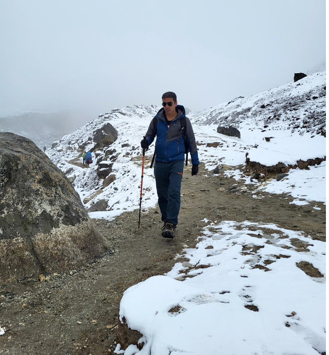 Trekking through snow on the EBC trail